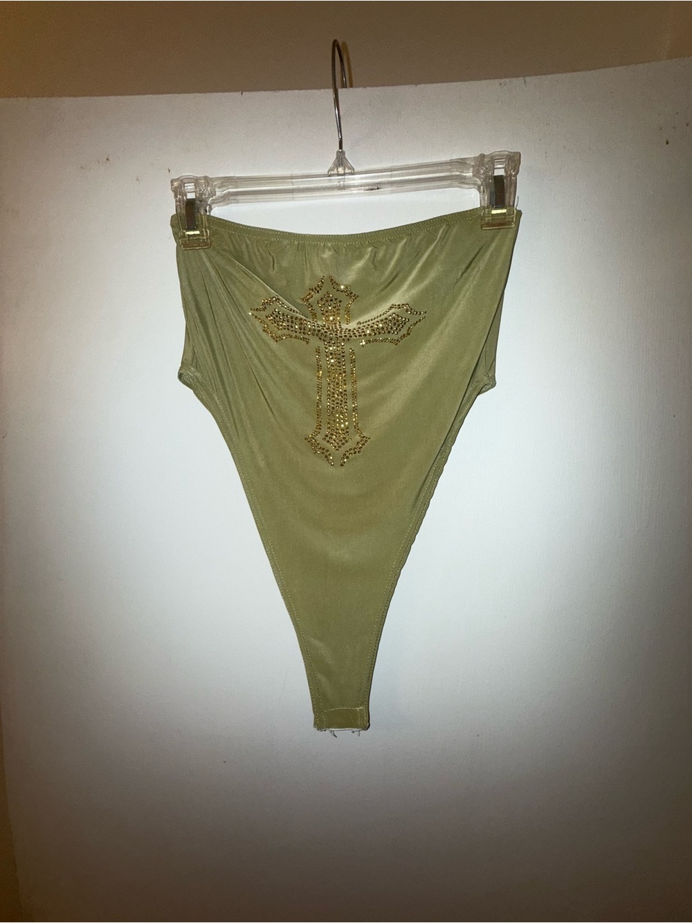 PrettyLittleThing Olive Green High Cut Bodysuit with Gold Stud Cross